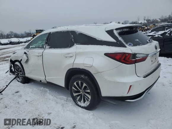 2021 Lexus RX with VIN JTJHZKFA6M2034049, listed as a Copart auction lot 44981475 with 56,053 mi miles and Salvage Title. Bid and sale history available at carsss.com. Image 2.