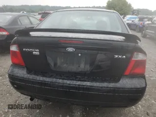 2005 Ford Focus S with VIN 1FAFP34N45W285454, listed as a Copart auction lot 59043485 with 165,071 mi miles and Salvage title. Bid and sale history available at DreamBid. Image 6.
