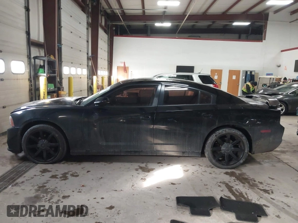 2012 Dodge Charger SXT with VIN 2C3CDXHG5CH132185, listed as a IAAI auction lot 41436027 with 209,648 mi miles. Bid and sale history available at carsss.com. Image 14.