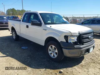 2013 Ford F-150 XL with VIN 1FTEX1CM9DFA57144, listed as a IAAI auction lot 41676679 with 154,303 mi miles. Bid and sale history available at carsss.com. Image 1.