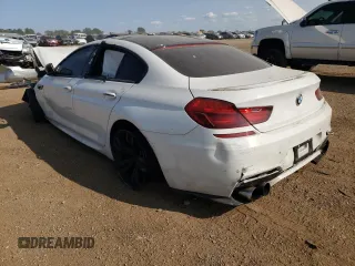 2015 BMW M6 z VIN WBS6C9C51FD467998, wystawiony jako Copart lot #67775934 z przebiegiem Nie podano mil oraz Szkody całkowita. Historia ofert i sprzedaży dostępna na DreamBid. Obrazek 2.