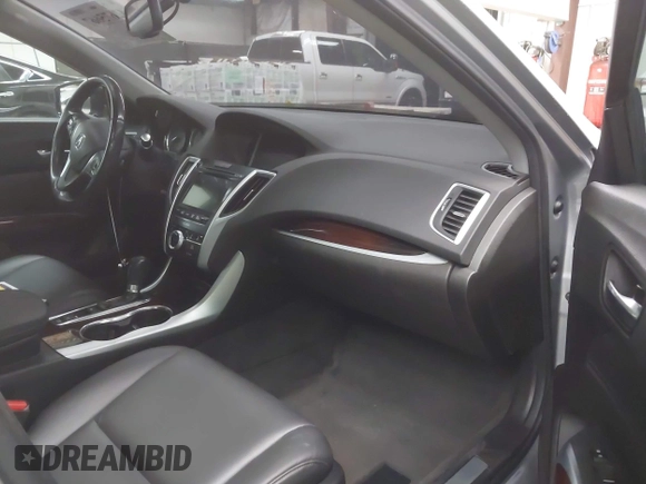 2017 Acura TLX with VIN 19UUB1F31HA007873, listed as a IAAI auction lot 42675667 with 125,869 mi miles and . Bid and sale history available at DreamBid. Image 5.