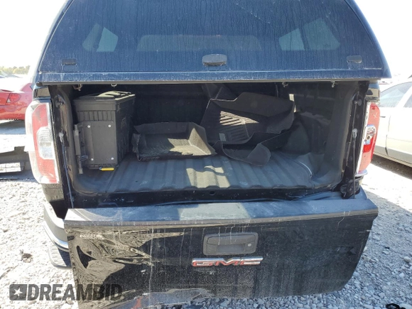 2015 GMC Canyon 2WD SLT with VIN 1GTG5CE33F1217419, listed as a Copart auction lot 73467364 with 114,542 mi miles and Salvage Title. Bid and sale history available at carsss.com. Image 6.