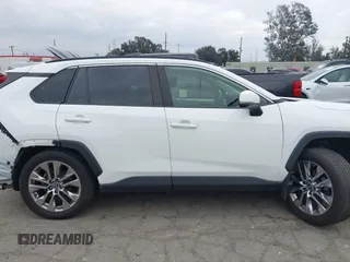 2019 Toyota RAV4 XLE Premium with VIN JTMA1RFV9KD513395, listed as a IAAI auction lot 41469143 with 28,406 mi miles. Bid and sale history available at carsss.com. Image 14.