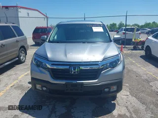 2020 Honda Ridgeline RTL with VIN 5FPYK3F5XLB019296, listed as a IAAI auction lot 42204290 with 48,197 mi miles and . Bid and sale history available at DreamBid. Image 12.