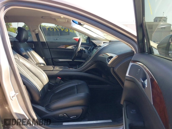 2016 Lincoln MKZ z VIN 3LN6L2G96GR601677, wystawiony jako IAAI lot #42647759 z przebiegiem 87 283 mil mil oraz . Historia ofert i sprzedaży dostępna na DreamBid. Obrazek 5.