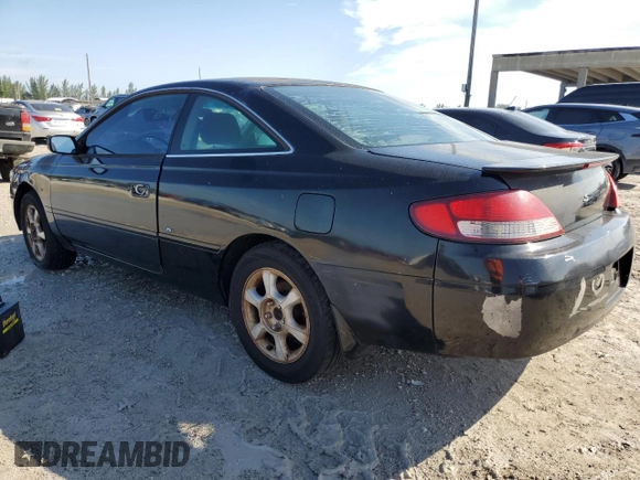 2000 Toyota Solara SE with VIN 2T1CF22P7YC263427, listed as a Copart auction lot 76457634 with Not Provided miles and Salvage Title. Bid and sale history available at DreamBid. Image 2.
