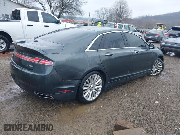 2015 Lincoln MKZ z VIN 3LN6L2J90FR616800, wystawiony jako IAAI lot #41683401 z przebiegiem 92 239 mil mil oraz . Historia ofert i sprzedaży dostępna na DreamBid. Obrazek 4.