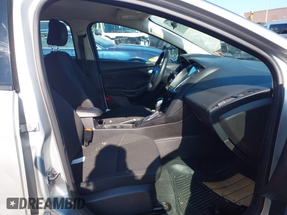 2015 Ford Focus SE with VIN 1FADP3F24FL301732, listed as a IAAI auction lot 42539183 with 127,045 mi miles and . Bid and sale history available at DreamBid. Image 5.