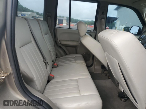 2006 Jeep Liberty Limited z VIN 1J4GL58K96W237675, wystawiony jako Copart lot #61155635 z przebiegiem 121 285 mil mil oraz Szkoda całkowita • Salvage title. Historia ofert i sprzedaży dostępna na DreamBid. Obrazek 11.
