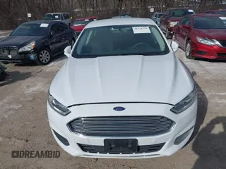 2014 Ford Fusion SE Hybrid with VIN 3FA6P0LU4ER243067, listed as a IAAI auction lot 41378720 with 129,625 mi miles. Bid and sale history available at carsss.com. Image 6.