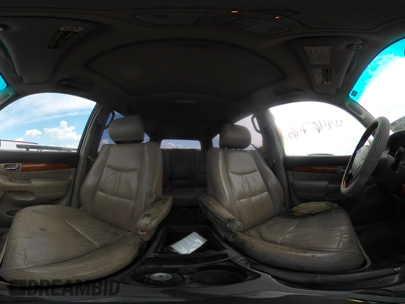 2003 Lexus GX 470 z VIN JTJBT20X930014196, wystawiony jako IAAI lot #42467486 z przebiegiem 282 962 mil mil oraz . Historia ofert i sprzedaży dostępna na DreamBid. Obrazek 18.