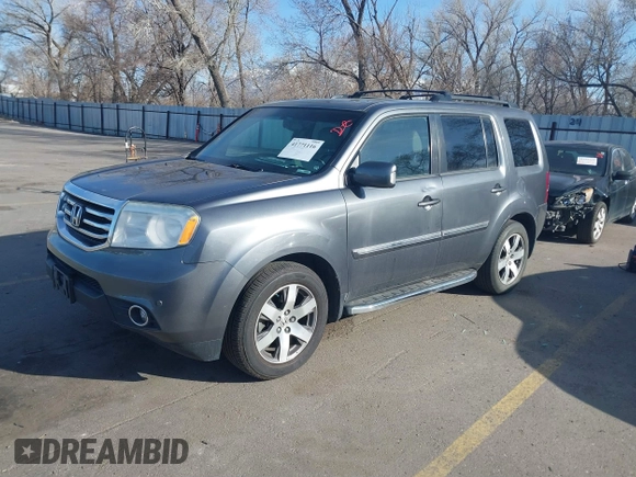2013 Honda Pilot Touring with VIN 5FNYF4H94DB035692, listed as a IAAI auction lot 41771116 with 137,464 mi miles and . Bid and sale history available at carsss.com. Image 2.