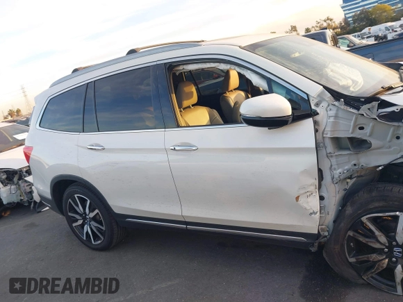 2019 Honda Pilot Touring 8-Passenger with VIN 5FNYF5H97KB005203, listed as a IAAI auction lot 41399930 with 47,267 mi miles and . Bid and sale history available at DreamBid. Image 13.