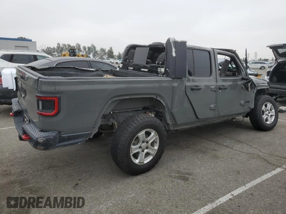 2020 Jeep Gladiator Sport S z VIN 1C6HJTAG6LL193553, wystawiony jako Copart lot #55638915 z przebiegiem 84 600 mil mil oraz Szkoda całkowita • Salvage title. Historia ofert i sprzedaży dostępna na DreamBid. Obrazek 3.