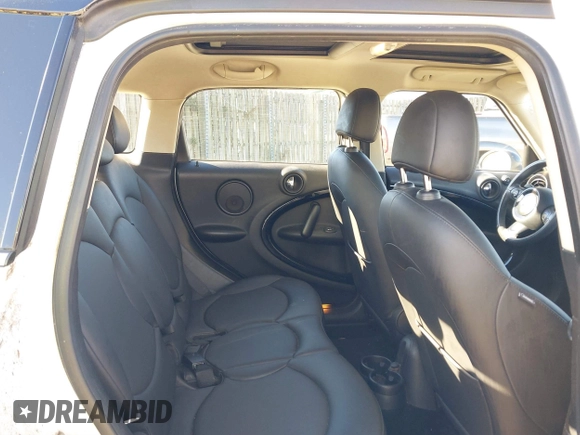 2014 MINI Countryman S z VIN WMWZC5C57EWP38396, wystawiony jako IAAI lot #41027727 z przebiegiem 147 260 mil mil oraz . Historia ofert i sprzedaży dostępna na DreamBid. Obrazek 8.
