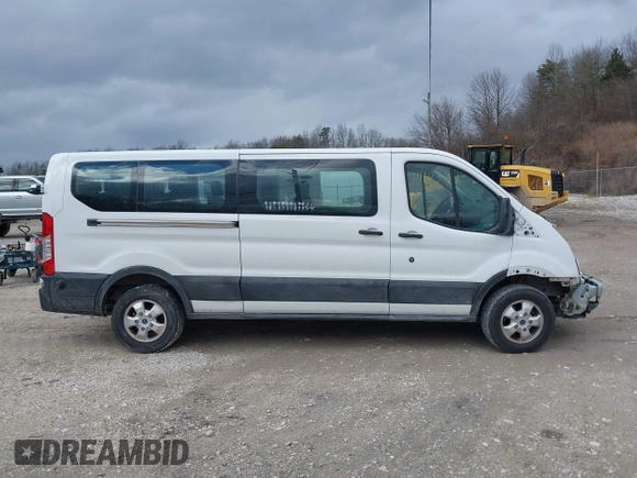 2019 Ford Transit Passenger XL z VIN 1FBZX2YM8KKA31871, wystawiony jako IAAI lot #41168344 z przebiegiem 95 957 mil mil oraz . Historia ofert i sprzedaży dostępna na DreamBid. Obrazek 14.