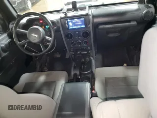 2008 Jeep Wrangler Unlimited X with VIN 1J4GA39158L610358, listed as a Copart auction lot 51274345 with 179,076 mi miles and Salvage Title. Bid and sale history available at DreamBid. Image 8.