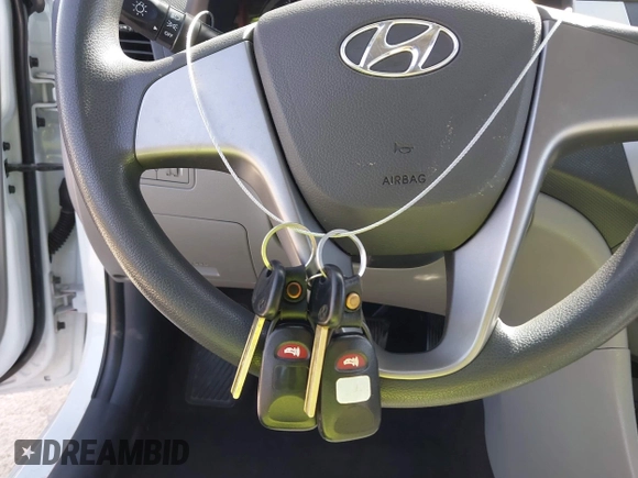 2015 Hyundai Accent GLS with VIN KMHCT4AE3FU892067, listed as a IAAI auction lot 41752679 with 72,415 mi miles and . Bid and sale history available at DreamBid. Image 11.