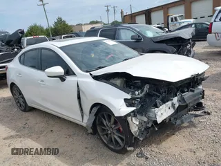 2018 Mazda 3 Touring z VIN 3MZBN1V34JM247648, wystawiony jako IAAI lot #40515731 z przebiegiem 139 789 mil mil oraz . Historia ofert i sprzedaży dostępna na DreamBid. Obrazek 1.