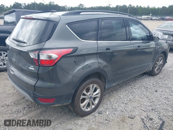 2017 Ford Escape SE z VIN 1FMCU0GD8HUE00754, wystawiony jako IAAI lot #42127911 z przebiegiem 169 487 mil mil oraz . Historia ofert i sprzedaży dostępna na DreamBid. Obrazek 4.