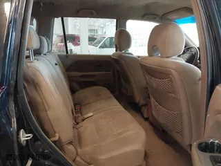 2008 Honda Pilot EX with VIN 5FNYF18418B029986, listed as a IAAI auction lot 41474195 with 230,524 mi miles. Bid and sale history available at carsss.com. Image 8.