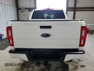 2023 Ford Ranger XL with VIN 1FTER4FHXPLE05663, listed as a Copart auction lot 60577925 with 29,218 mi miles and Salvage title. Bid and sale history available at DreamBid. Image 6.