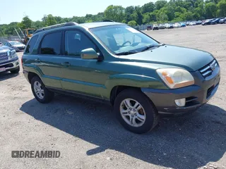2006 Kia Sportage LX z VIN KNDJF723667168356, wystawiony jako IAAI lot #42559642 z przebiegiem 116 988 mil mil oraz . Historia ofert i sprzedaży dostępna na DreamBid. Obrazek 1.