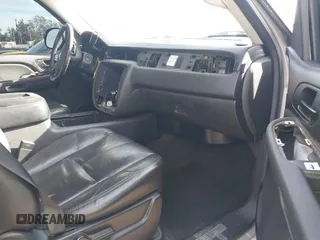 2007 Chevrolet Tahoe LTZ with VIN 1GNFC13077J399911, listed as a IAAI auction lot 41141878 with Not provided miles and . Bid and sale history available at DreamBid. Image 5.