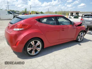 2016 Hyundai Veloster z VIN KMHTC6ADXGU270540, wystawiony jako Copart lot #54575165 z przebiegiem 122 606 mil mil oraz Szkody całkowita. Historia ofert i sprzedaży dostępna na DreamBid. Obrazek 3.