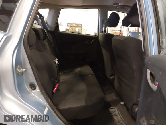 2009 Honda Fit Sport with VIN JHMGE88489S005033, listed as a IAAI auction lot 41861124 with 56,148 mi miles and . Bid and sale history available at DreamBid. Image 8.