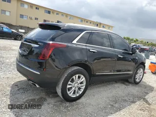 2021 Cadillac XT5 FWD Luxury with VIN 1GYKNAR46MZ127028, listed as a Copart auction lot 47555235 with 48,364 mi miles and Salvage Title. Bid and sale history available at carsss.com. Image 3.