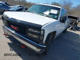 1996 GMC Sierra 1500 with VIN 1GTGC33R4TF018147, listed as a IAAI auction lot 41612770 with 106,443 mi miles and . Bid and sale history available at DreamBid. Image 17.