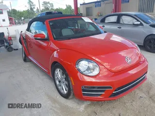 2018 Volkswagen Beetle S with VIN 3VW5DAAT3JM506460, listed as a IAAI auction lot 41556365 with 49,674 mi miles and . Bid and sale history available at DreamBid. Image 1.