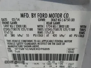 2014 Ford F-150 XL with VIN 1FTMF1CM2EKD70205, listed as a Copart auction lot 43963335 with 214,912 mi miles and Salvage title. Bid and sale history available at DreamBid. Image 12.