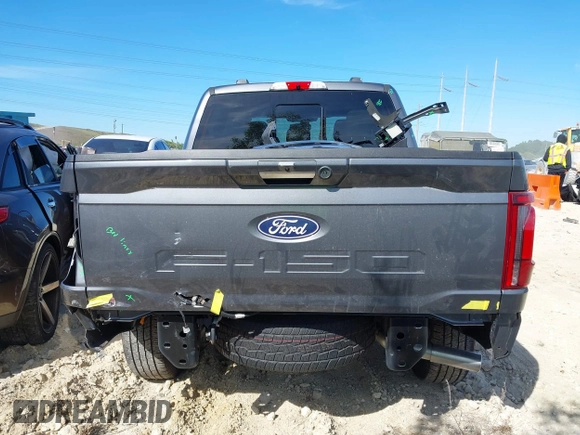 2024 Ford F-150 with VIN 1FTFW7LD5RFA46711, listed as a IAAI auction lot 41740624 with 11,736 mi miles and . Bid and sale history available at DreamBid. Image 6.