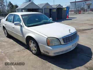 2004 Cadillac DeVille z VIN 1G6KD54Y74U129218, wystawiony jako IAAI lot #41786756 z przebiegiem 167 125 mil mil oraz . Historia ofert i sprzedaży dostępna na DreamBid. Obrazek 1.