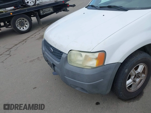 2004 Ford Escape XLS with VIN 1FMYU02104KB25647, listed as a IAAI auction lot 41916737 with 199,361 mi miles and . Bid and sale history available at DreamBid. Image 13.