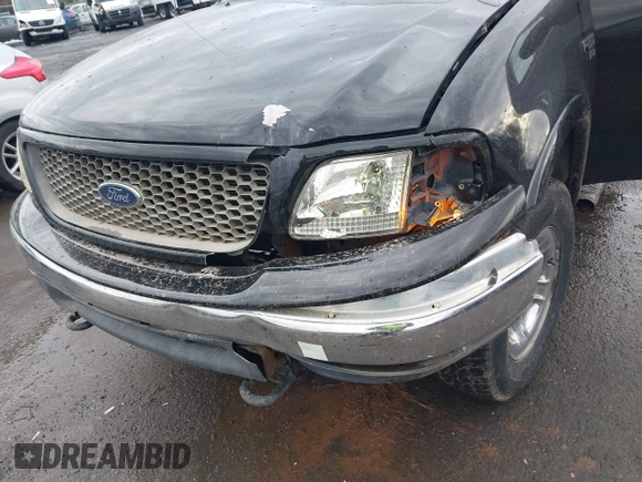 2000 Ford F-150 XL with VIN 1FTRX18W9YNA63551, listed as a IAAI auction lot 41446703 with Not provided miles and . Bid and sale history available at DreamBid. Image 6.