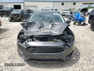 2015 Ford Focus SE z VIN 1FADP3F24FL357329, wystawiony jako Copart lot #59976215 z przebiegiem 182 407 mil mil oraz Czysty tytuł • Clean title. Historia ofert i sprzedaży dostępna na DreamBid. Obrazek 5.