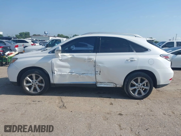 2010 Lexus RX 350 z VIN JTJZK1BA6A2406283, wystawiony jako IAAI lot #42212441 z przebiegiem 205 093 mil mil oraz . Historia ofert i sprzedaży dostępna na DreamBid. Obrazek 14.