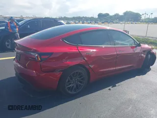 2025 Tesla Model 3 Long Range with VIN 5YJ3E1EA6SF967254, listed as a IAAI auction lot 42345651 with 1,180 mi miles and . Bid and sale history available at DreamBid. Image 4.