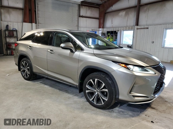 2020 Lexus RX 350L with VIN JTJHZKFA7L2024953, listed as a Copart auction lot 85044234 with 60,874 mi miles and Salvage title. Bid and sale history available at DreamBid. Image 4.