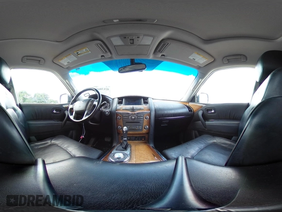 2012 Infiniti QX56 7-passenger z VIN JN8AZ2NF9C9517675, wystawiony jako IAAI lot #42138696 z przebiegiem 129 478 mil mil oraz . Historia ofert i sprzedaży dostępna na DreamBid. Obrazek 23.