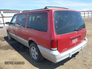 1994 Dodge Caravan Grand SE z VIN 1B4GH4432RX349830, wystawiony jako IAAI lot #42217968 z przebiegiem 161 577 mil mil oraz . Historia ofert i sprzedaży dostępna na DreamBid. Obrazek 3.