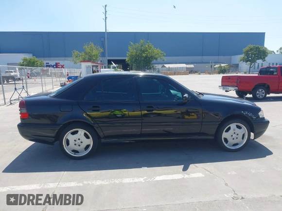 1999 Mercedes-Benz C with VIN WDBHA33G3XF889442, listed as a IAAI auction lot 42403800 with 82,075 mi miles and . Bid and sale history available at DreamBid. Image 13.