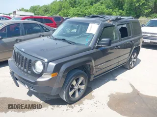 2016 Jeep Patriot Latitude with VIN 1C4NJRFB7GD658594, listed as a IAAI auction lot 42066483 with 146,492 mi miles. Bid and sale history available at carsss.com. Image 21.