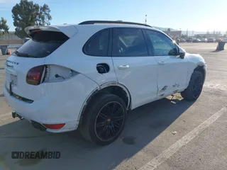 2013 Porsche Cayenne GTS with VIN WP1AD2A22DLA71143, listed as a IAAI auction lot 41287138 with 143,434 mi miles and . Bid and sale history available at DreamBid. Image 4.