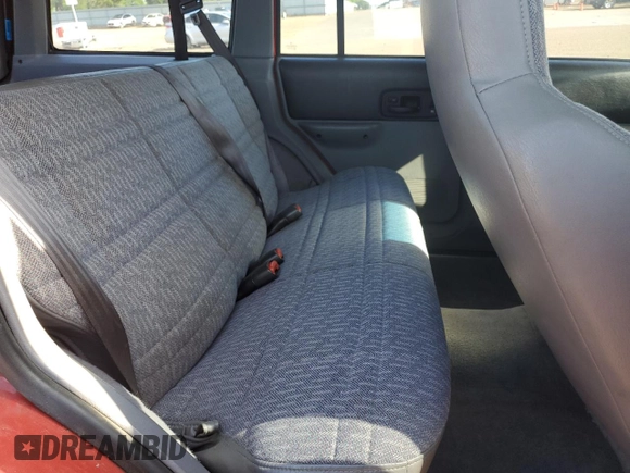 1998 Jeep Cherokee Sport with VIN 1J4FJ68S3WL167809, listed as a Copart auction lot 53829645 with Not provided miles and Salvage title. Bid and sale history available at DreamBid. Image 11.