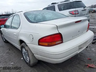 1999 Dodge Stratus with VIN 1B3EJ46X6XN614967, listed as a IAAI auction lot 41663475 with 130,245 mi miles. Bid and sale history available at carsss.com. Image 3.